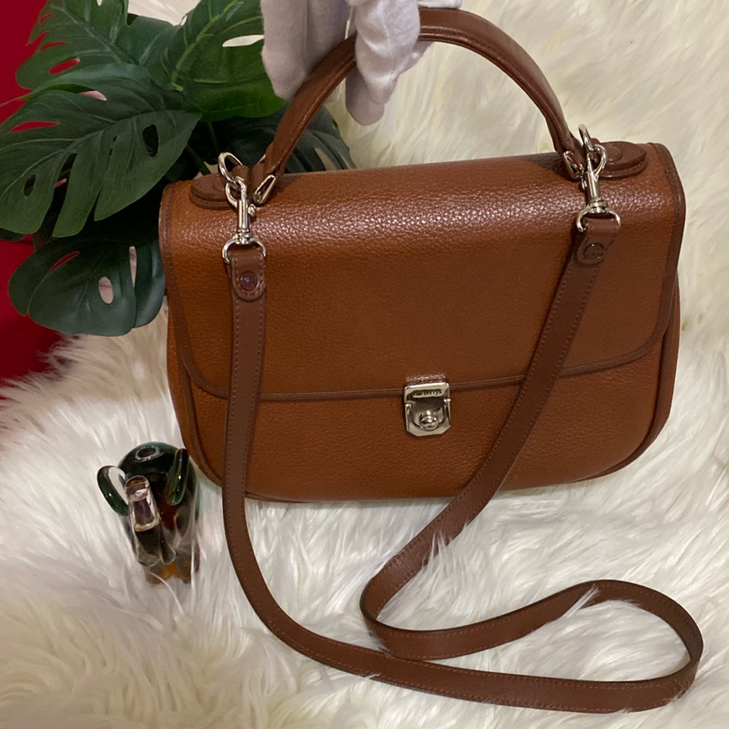 Burberrys Brown Crossbody Bag. Shoulder Strap 22”. Size 10”X3”X7.75”